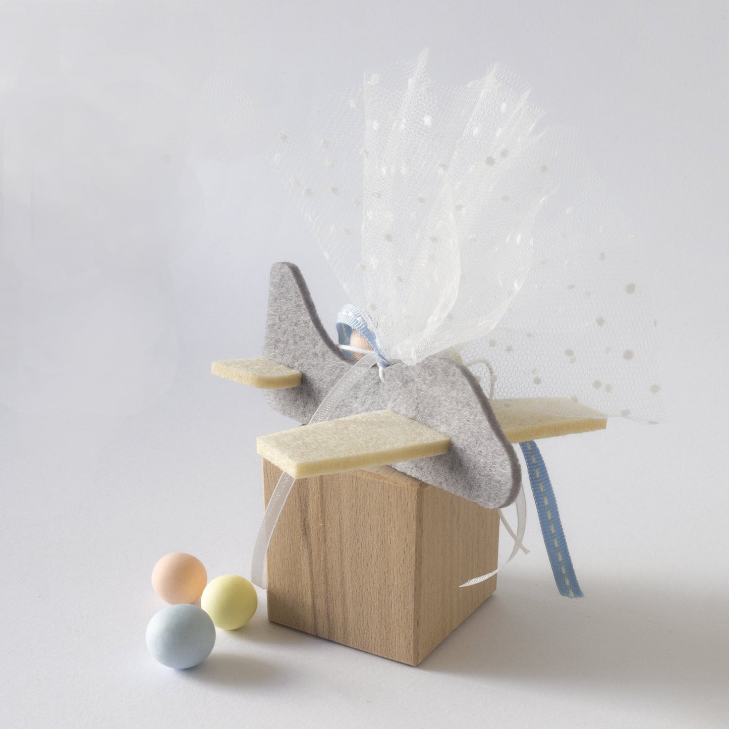 White-grey airplane baptism favors