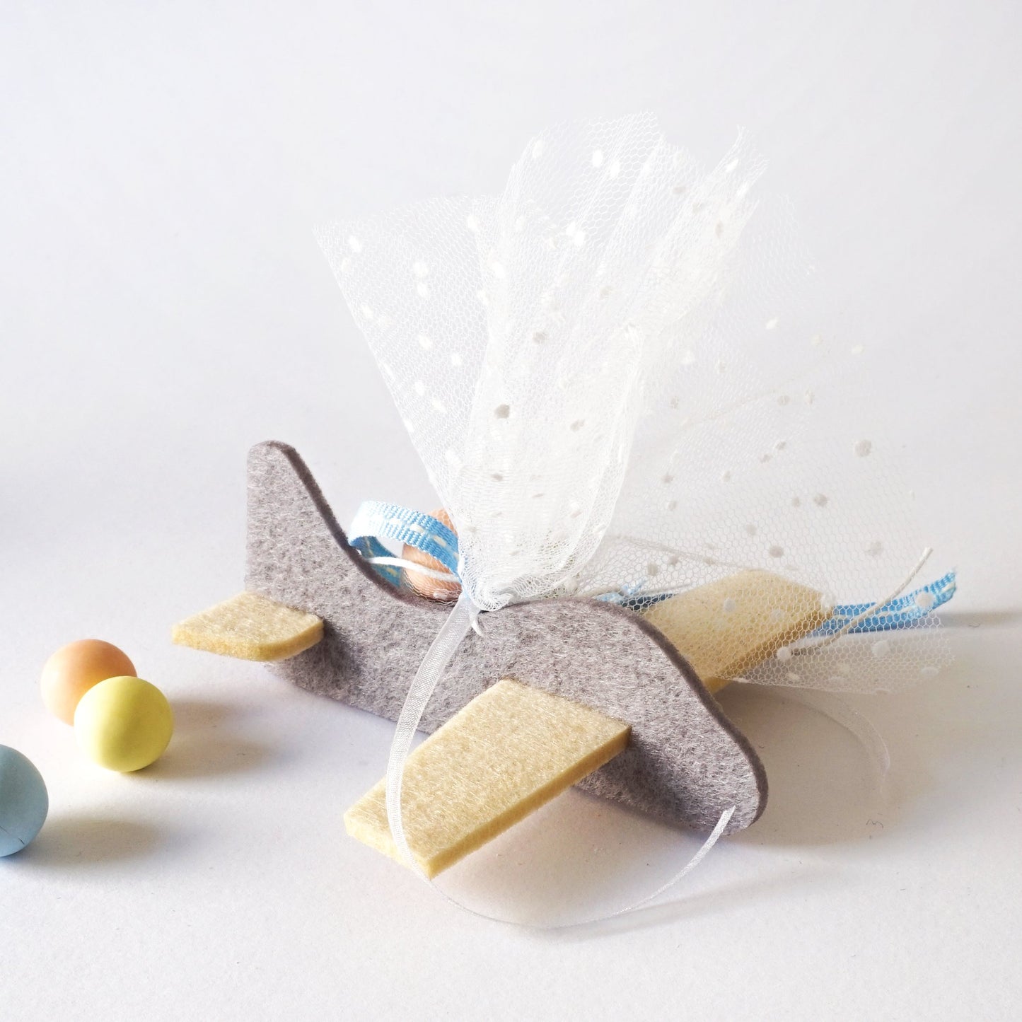 White-grey airplane baptism favors